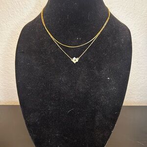 Elegant Gold Necklace with Silver Accents